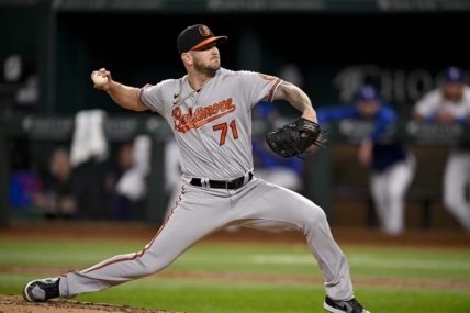 Apr 4, 2023; Arlington, Texas, USA; Baltimore Orioles relief pitcher Logan Gillaspie (71) pitches against the Texas Rangers during the game at Globe Life Field. Mandatory Credit: Jerome Miron-USA TODAY Sports