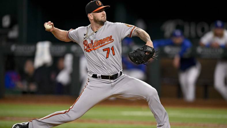 Apr 4, 2023; Arlington, Texas, USA; Baltimore Orioles relief pitcher Logan Gillaspie (71) pitches against the Texas Rangers during the game at Globe Life Field. Mandatory Credit: Jerome Miron-USA TODAY Sports