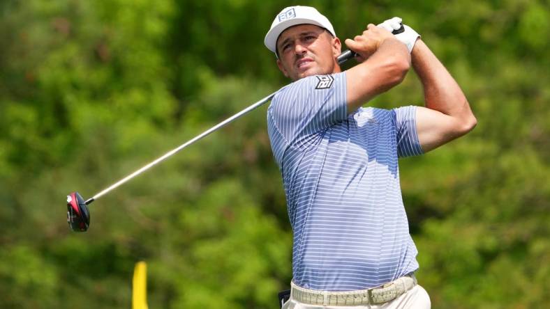 Apr 6, 2023; Augusta, Georgia, USA; Bryson DeChambeau tees off on the fifth hole during the first round of The Masters golf tournament. Mandatory Credit: Kyle Terada-USA TODAY Network