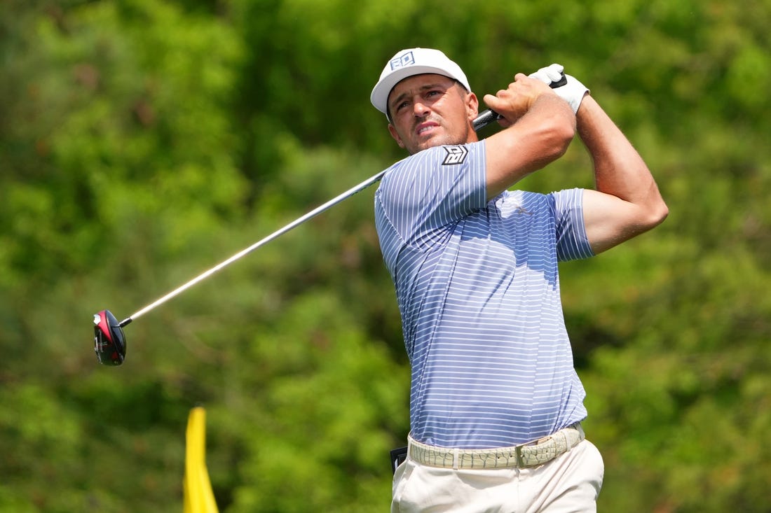 Apr 6, 2023; Augusta, Georgia, USA; Bryson DeChambeau tees off on the fifth hole during the first round of The Masters golf tournament. Mandatory Credit: Kyle Terada-USA TODAY Network