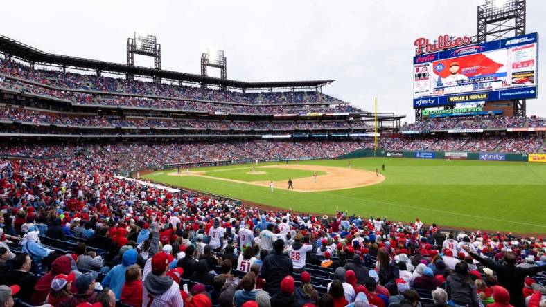 Apr 7, 2023; Philadelphia, Pennsylvania, USA; General view as Philadelphia Phillies shortstop Edmundo Sosa (33) hits a home run during the eighth inning against the Cincinnati Reds at Citizens Bank Park. Mandatory Credit: Bill Streicher-USA TODAY Sports