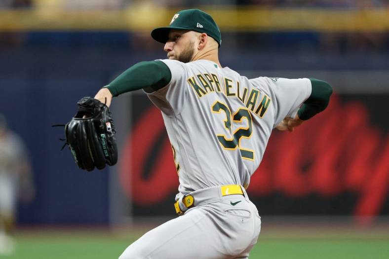 Apr 9, 2023; St. Petersburg, Florida, USA;  Oakland Athletics starting pitcher James Kaprielian (32) throws a pitch against the Tampa Bay Rays in the third inning at Tropicana Field. Mandatory Credit: Nathan Ray Seebeck-USA TODAY Sports