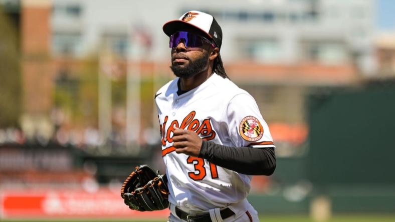 Apr 8, 2023; Baltimore, Maryland, USA;  Baltimore Orioles center fielder Cedric Mullins (31) run to the dugout before the game against the New York Yankees at Oriole Park at Camden Yards. Mandatory Credit: Tommy Gilligan-USA TODAY Sports