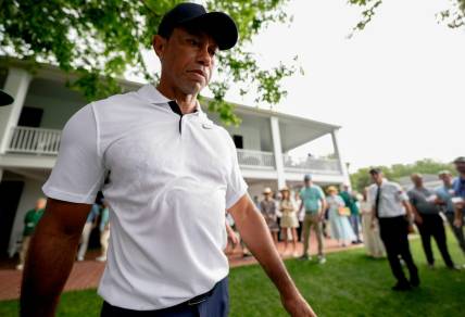 Tiger Woods walks out of the clubhouse on his way to the first tee during the first round of The Masters golf tournament at the Augusta National Golf Club in Augusta, Ga., on April 6, 2023.

Pga Masters Tournament First Round