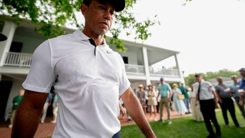 Tiger Woods walks out of the clubhouse on his way to the first tee during the first round of The Masters golf tournament at the Augusta National Golf Club in Augusta, Ga., on April 6, 2023.

Pga Masters Tournament First Round