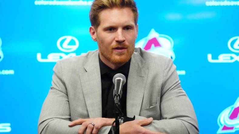 Apr 13, 2023; Denver, Colorado, USA; Colorado Avalanche left wing Gabriel Landeskog (92) speaks to the media before the game at Ball Arena. Mandatory Credit: Ron Chenoy-USA TODAY Sports