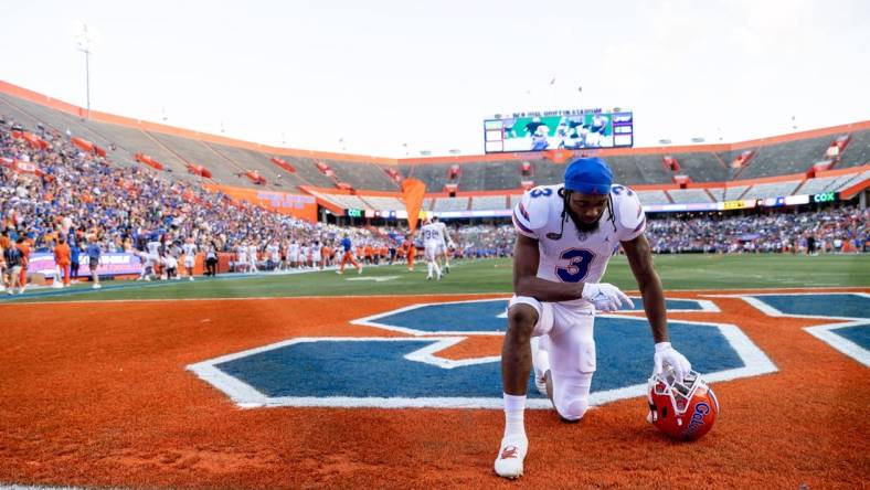 Florida Gators wide receiver Xzavier Henderson (3) prays before the game during the Florida Gators Orange and Blue Spring Game at Steve Spurrier Field at Ben Hill Griffin Stadium in Gainesville, FL on Thursday, April 13, 2023. [Matt Pendleton/Gainesville Sun]

Ncaa Football Florida Gators Orange Blue Spring Game