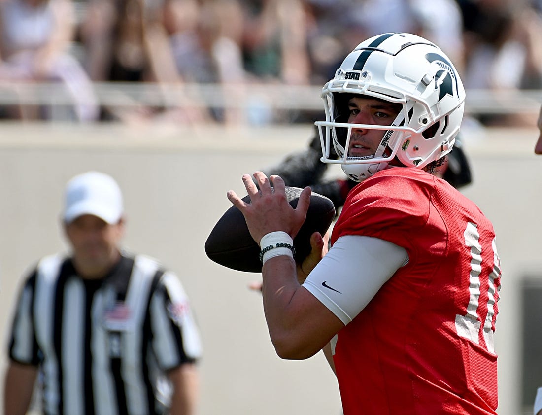 Apr 15, 2023; East Lansing, MI, USA;  Michigan State Spartans quarterback Payton Thorne (10) throws downfield at Spartan Stadium. Mandatory Credit: Dale Young-USA TODAY Sports