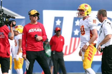 Apr 15, 2023; Memphis, TN, USA; Philadelphia Stars head coach Bart Andrus (left) talks with quarterback Case Cookus (10) during a timeout in the first half against the Memphis Showboats at Simmons Bank Liberty Stadium. Mandatory Credit: Petre Thomas-USA TODAY Sports