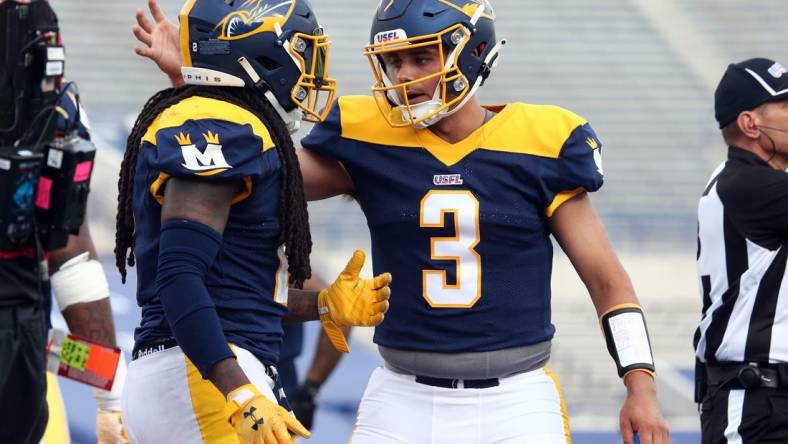 Apr 15, 2023; Memphis, TN, USA; Memphis Showboats quarterback Brady White (3) reacts with running back Alex Collins (2) during the second half against the Philadelphia Stars at Simmons Bank Liberty Stadium. Mandatory Credit: Petre Thomas-USA TODAY Sports