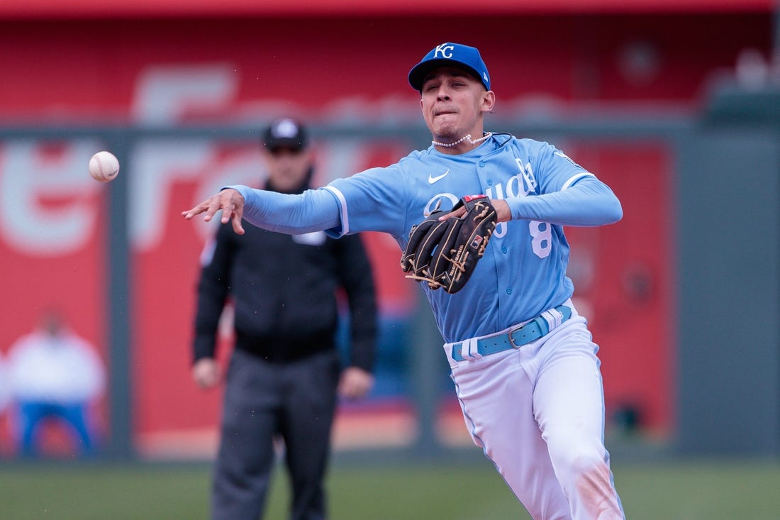 Apr 16, 2023; Kansas City, Missouri, USA; Kansas City Royals shortstop Nicky Lopez (8) throws to first base during the sixth inning against the Atlanta Braves at Kauffman Stadium. Mandatory Credit: William Purnell-USA TODAY Sports