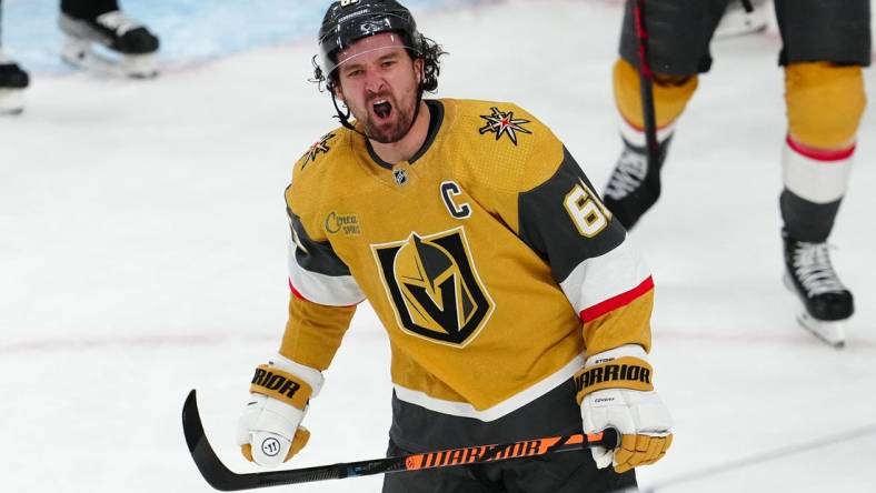 Apr 20, 2023; Las Vegas, Nevada, USA; Vegas Golden Knights forward Mark Stone (61) celebrates after scoring a goal against the Winnipeg Jets during the third period of game two of the first round of the 2023 Stanley Cup Playoffs at T-Mobile Arena. Mandatory Credit: Stephen R. Sylvanie-USA TODAY Sports