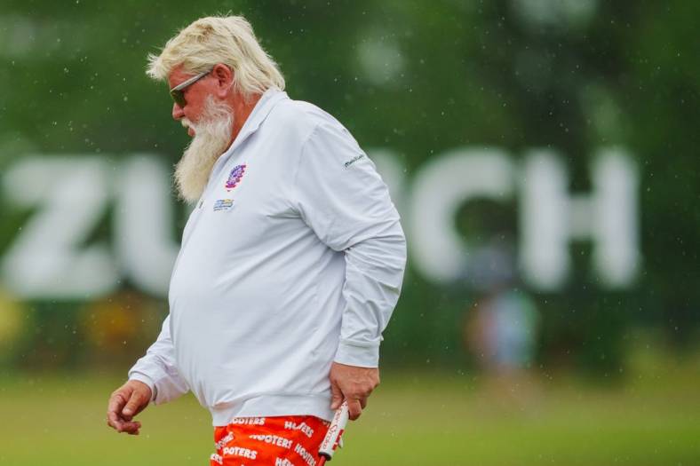Apr 21, 2023; Avondale, Louisiana, USA; John Daly walks the 18th green during the second round of the Zurich Classic of New Orleans golf tournament. Mandatory Credit: Andrew Wevers-USA TODAY Sports