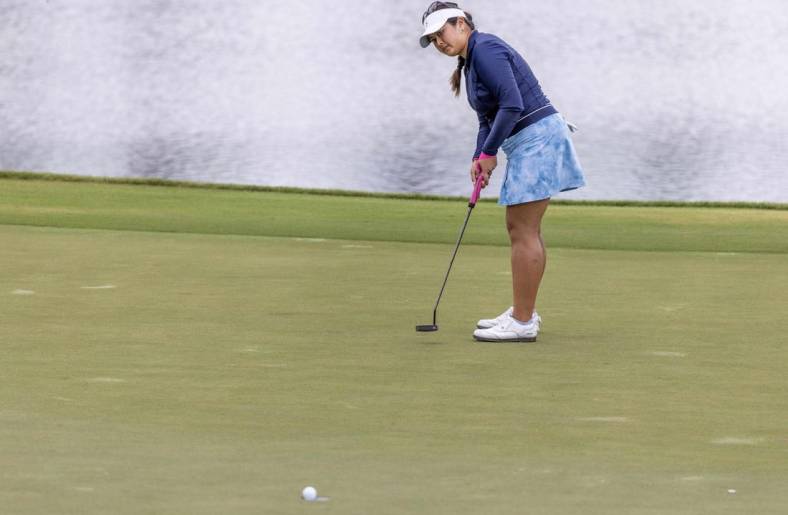 Apr 21, 2023; The Woodlands, Texas, USA;  Lilia Vu (USA) sinks a putt on the ninth green during the second round of The Chevron Championship golf tournament. Mandatory Credit: Thomas Shea-USA TODAY Sports