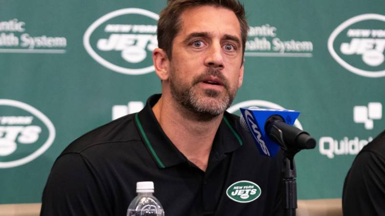 Apr 26, 2023; Florham Park, NJ, USA; New York Jets quarterback Aaron Rodgers (8) answers questions during the introductory press conference at Atlantic Health Jets Training Center. Mandatory Credit: Tom Horak-USA TODAY Sports