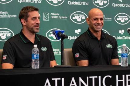 Apr 26, 2023; Florham Park, NJ, USA; New York Jets quarterback Aaron Rodgers (left) and head coach Robert Saleh (right) smile during the introductory press conference at Atlantic Health Jets Training Center. Mandatory Credit: Tom Horak-USA TODAY Sports