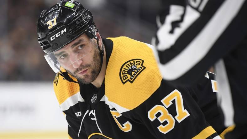 Apr 26, 2023; Boston, Massachusetts, USA; Boston Bruins center Patrice Bergeron (37) gets ready for a face-off during the first period in game five of the first round of the 2023 Stanley Cup Playoffs against the Florida Panthers at TD Garden. Mandatory Credit: Bob DeChiara-USA TODAY Sports