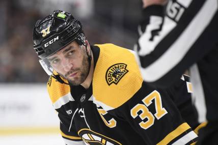 Apr 26, 2023; Boston, Massachusetts, USA; Boston Bruins center Patrice Bergeron (37) gets ready for a face-off during the first period in game five of the first round of the 2023 Stanley Cup Playoffs against the Florida Panthers at TD Garden. Mandatory Credit: Bob DeChiara-USA TODAY Sports