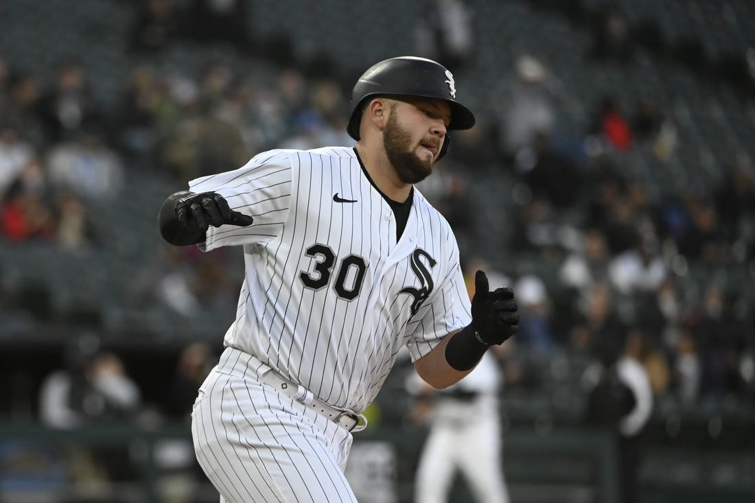 Apr 27, 2023; Chicago, Illinois, USA; Chicago White Sox third baseman Jake Burger (30) reacts after hitting a home run against the Tampa Bay Rays during the fourth inning at Guaranteed Rate Field. Mandatory Credit: Matt Marton-USA TODAY Sports