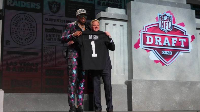 Apr 27, 2023; Kansas City, MO, USA;  Texas Tech defensive end Tyree Wilson with NFL commissioner Roger Goodell after being selected by the Las Vegas Raiders seventh overall in the first round of the 2023 NFL Draft at Union Station. Mandatory Credit: Kirby Lee-USA TODAY Sports