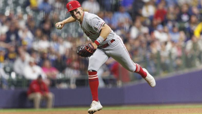 Apr 28, 2023; Milwaukee, Wisconsin, USA;  Los Angeles Angels shortstop Zach Neto (9) throws to first base during the fifth inning against the Milwaukee Brewers at American Family Field. Mandatory Credit: Jeff Hanisch-USA TODAY Sports