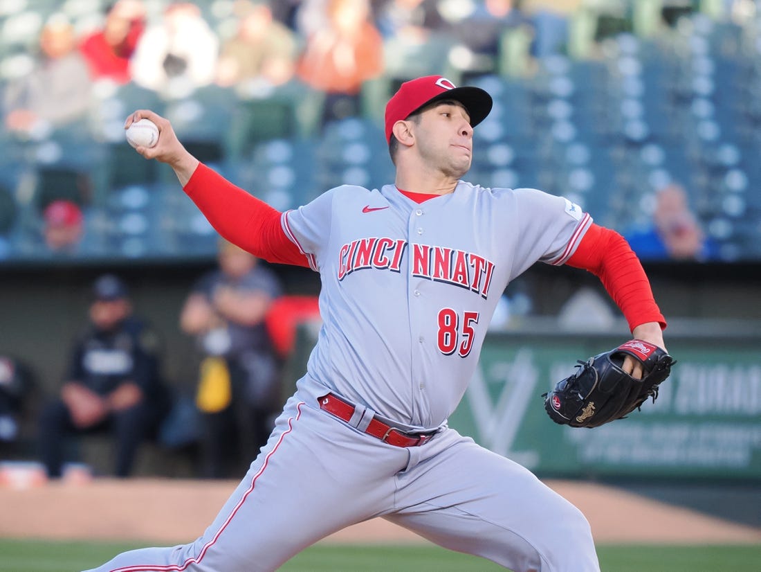 Apr 28, 2023; Oakland, California, USA; Cincinnati Reds starting pitcher Luis Cessa (85) pitches the ball against the Oakland Athletics during the first inning at Oakland Coliseum. Mandatory Credit: Kelley L Cox-USA TODAY Sports