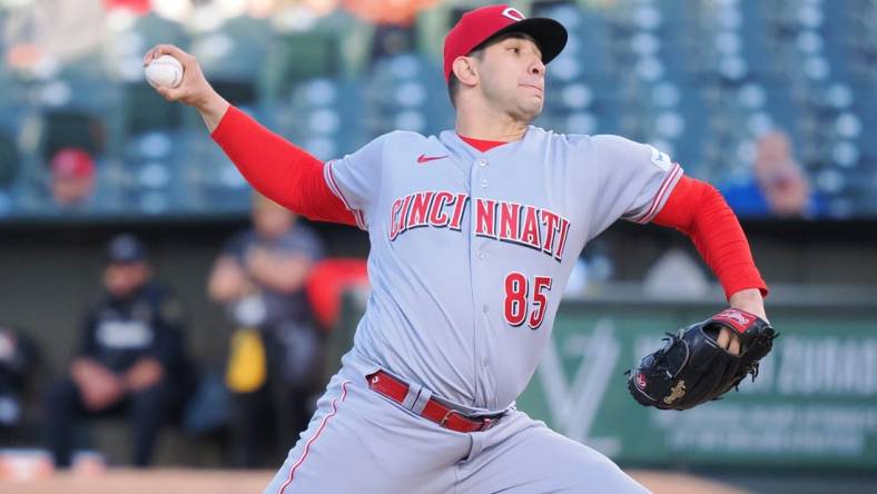 Apr 28, 2023; Oakland, California, USA; Cincinnati Reds starting pitcher Luis Cessa (85) pitches the ball against the Oakland Athletics during the first inning at Oakland Coliseum. Mandatory Credit: Kelley L Cox-USA TODAY Sports