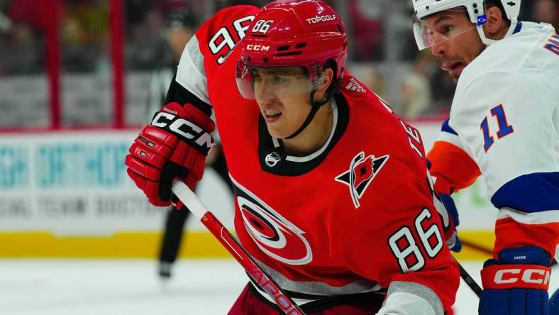 Apr 19, 2023; Raleigh, North Carolina, USA; Carolina Hurricanes left wing Teuvo Teravainen (86) skates against the New York Islanders during the third period in game two of the first round of the 2023 Stanley Cup Playoffs at PNC Arena. Mandatory Credit: James Guillory-USA TODAY Sports