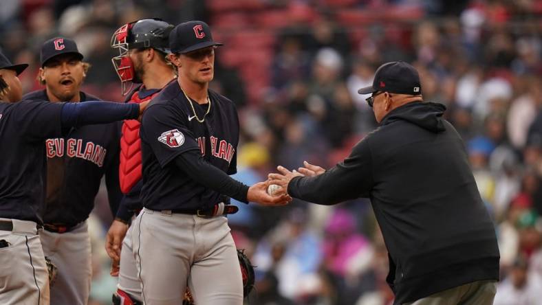 Apr 29, 2023; Boston, Massachusetts, USA; Cleveland Guardians starting pitcher Zach Plesac (34) is taken out of the game by manager Terry Francona (77) as they take on the Boston Red Sox in the fourth inning at Fenway Park. Mandatory Credit: David Butler II-USA TODAY Sports