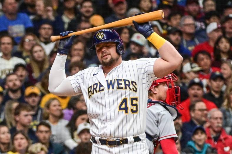 Apr 29, 2023; Milwaukee, Wisconsin, USA; Milwaukee Brewers first baseman Luke Voit (45) reacts after being called out on strikes against the Los Angeles Angels in the second inning at American Family Field. Mandatory Credit: Benny Sieu-USA TODAY Sports