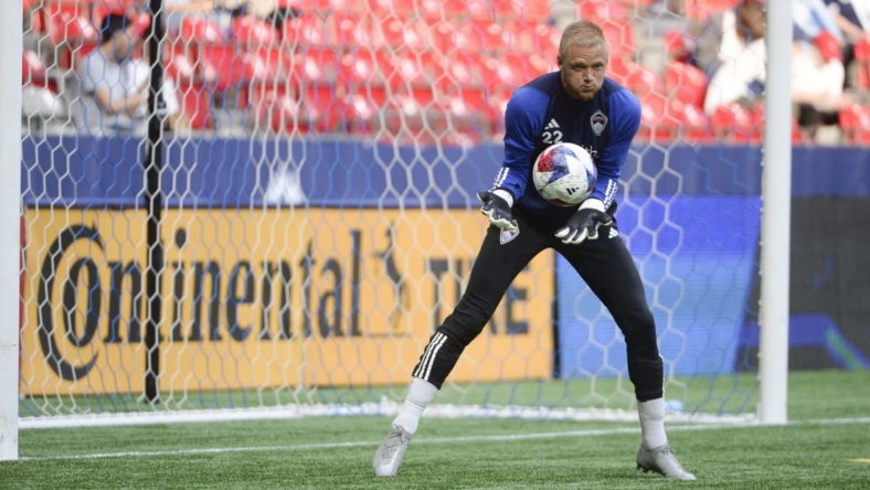 Apr 29, 2023; Vancouver, British Columbia, CAN;  Colorado Rapids goalkeeper William Yarbrough (22) warms up prior the the match against the Vancouver Whitecaps FC at BC Place. Mandatory Credit: Anne-Marie Sorvin-USA TODAY Sports