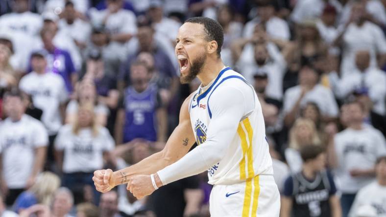 April 30, 2023; Sacramento, California, USA; Golden State Warriors guard Stephen Curry (30) celebrates against the Sacramento Kings during the third quarter in game seven of the 2023 NBA playoffs first round at Golden 1 Center. Mandatory Credit: Kyle Terada-USA TODAY Sports