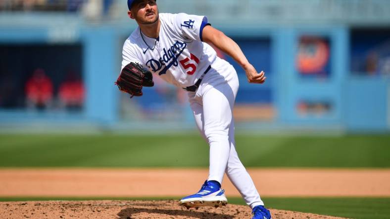 Apr 30, 2023; Los Angeles, California, USA; Los Angeles Dodgers relief pitcher Alex Vesia (51) throws against the St. Louis Cardinals during the seventh inning at Dodger Stadium. Mandatory Credit: Gary A. Vasquez-USA TODAY Sports