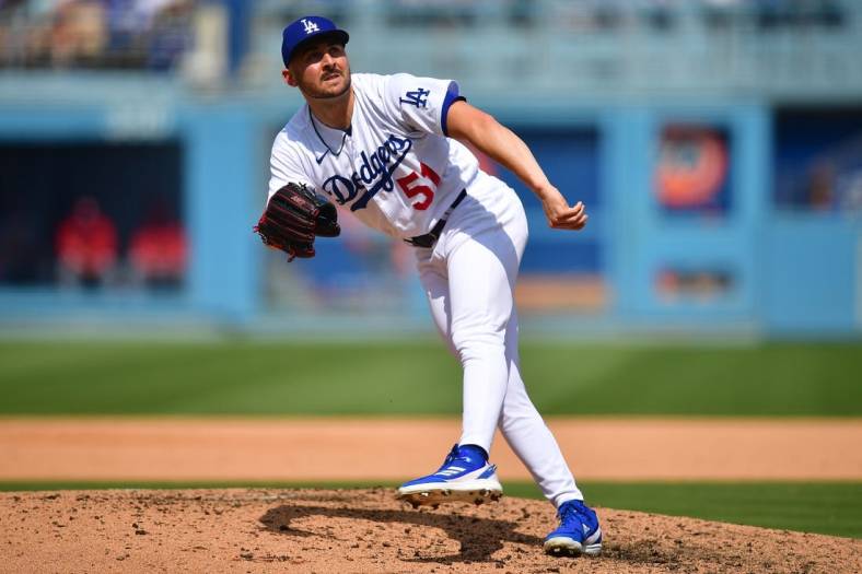 Apr 30, 2023; Los Angeles, California, USA; Los Angeles Dodgers relief pitcher Alex Vesia (51) throws against the St. Louis Cardinals during the seventh inning at Dodger Stadium. Mandatory Credit: Gary A. Vasquez-USA TODAY Sports