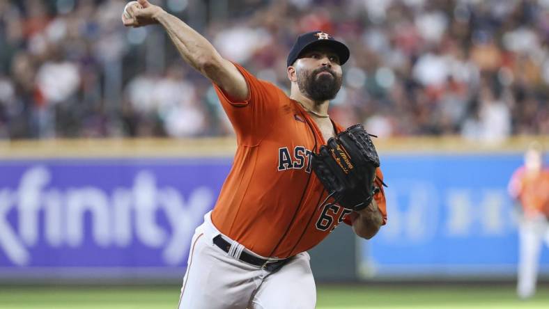 Apr 30, 2023; Houston, Texas, USA; Houston Astros starting pitcher Jose Urquidy (65) delivers a pitch during the second inning against the Philadelphia Phillies at Minute Maid Park. Mandatory Credit: Troy Taormina-USA TODAY Sports