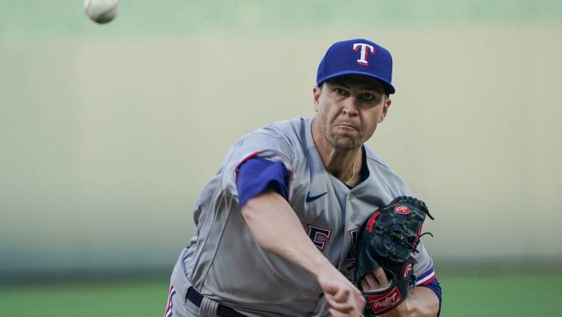 Apr 17, 2023; Kansas City, Missouri, USA; Texas Rangers starting pitcher Jacob deGrom (48) throws a warm up pitch against the Kansas City Royals during the game at Kauffman Stadium. Mandatory Credit: Denny Medley-USA TODAY Sports