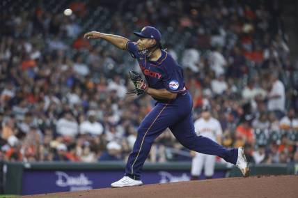 May 1, 2023; Houston, Texas, USA; Houston Astros starting pitcher Luis Garcia (77) delivers a pitch during the first inning aSan Francisco Giants at Minute Maid Park. Mandatory Credit: Troy Taormina-USA TODAY Sports