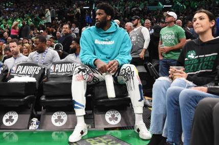 May 1, 2023; Boston, Massachusetts, USA; Injured Philadelphia 76ers center Joel Embiid (21) watches the action in the first half during game one of the 2023 NBA playoffs against the Boston Celtics at TD Garden. Mandatory Credit: Bob DeChiara-USA TODAY Sports