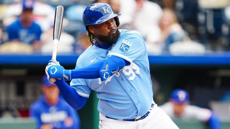 Apr 19, 2023; Kansas City, Missouri, USA; Kansas City Royals right fielder Franmil Reyes (99) bats during the sixth inning against the Texas Rangers at Kauffman Stadium. Mandatory Credit: Jay Biggerstaff-USA TODAY Sports