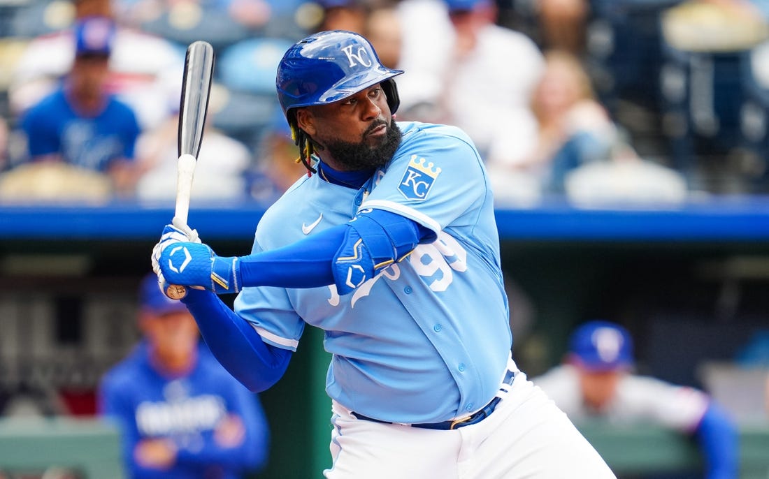 Apr 19, 2023; Kansas City, Missouri, USA; Kansas City Royals right fielder Franmil Reyes (99) bats during the sixth inning against the Texas Rangers at Kauffman Stadium. Mandatory Credit: Jay Biggerstaff-USA TODAY Sports