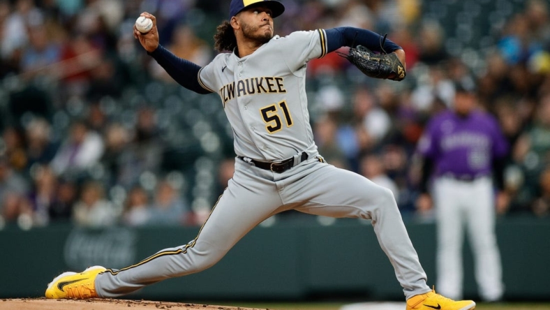 May 2, 2023; Denver, Colorado, USA; Milwaukee Brewers starting pitcher Freddy Peralta (51) pitches in the first inning against the Colorado Rockies at Coors Field. Mandatory Credit: Isaiah J. Downing-USA TODAY Sports