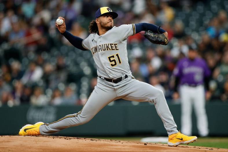 May 2, 2023; Denver, Colorado, USA; Milwaukee Brewers starting pitcher Freddy Peralta (51) pitches in the first inning against the Colorado Rockies at Coors Field. Mandatory Credit: Isaiah J. Downing-USA TODAY Sports