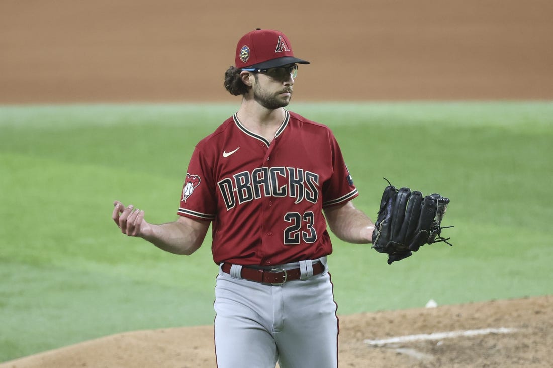 May 2, 2023; Arlington, Texas, USA; Arizona Diamondbacks starting pitcher Zac Gallen (23) reacts during the game against the Texas Rangers at Globe Life Field. Mandatory Credit: Kevin Jairaj-USA TODAY Sports