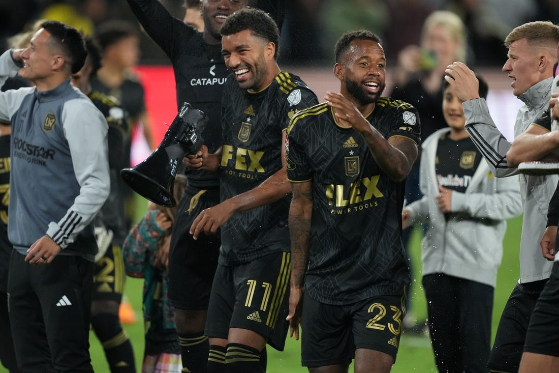 May 2, 2023; Los Angeles, CA, USA; LAFC midfielder Timothy Tillman (11) and midfielder Kellyn Acosta (23) celebrate after the game against the Philadelphia Union BMO Stadium. Mandatory Credit: Kirby Lee-USA TODAY Sports