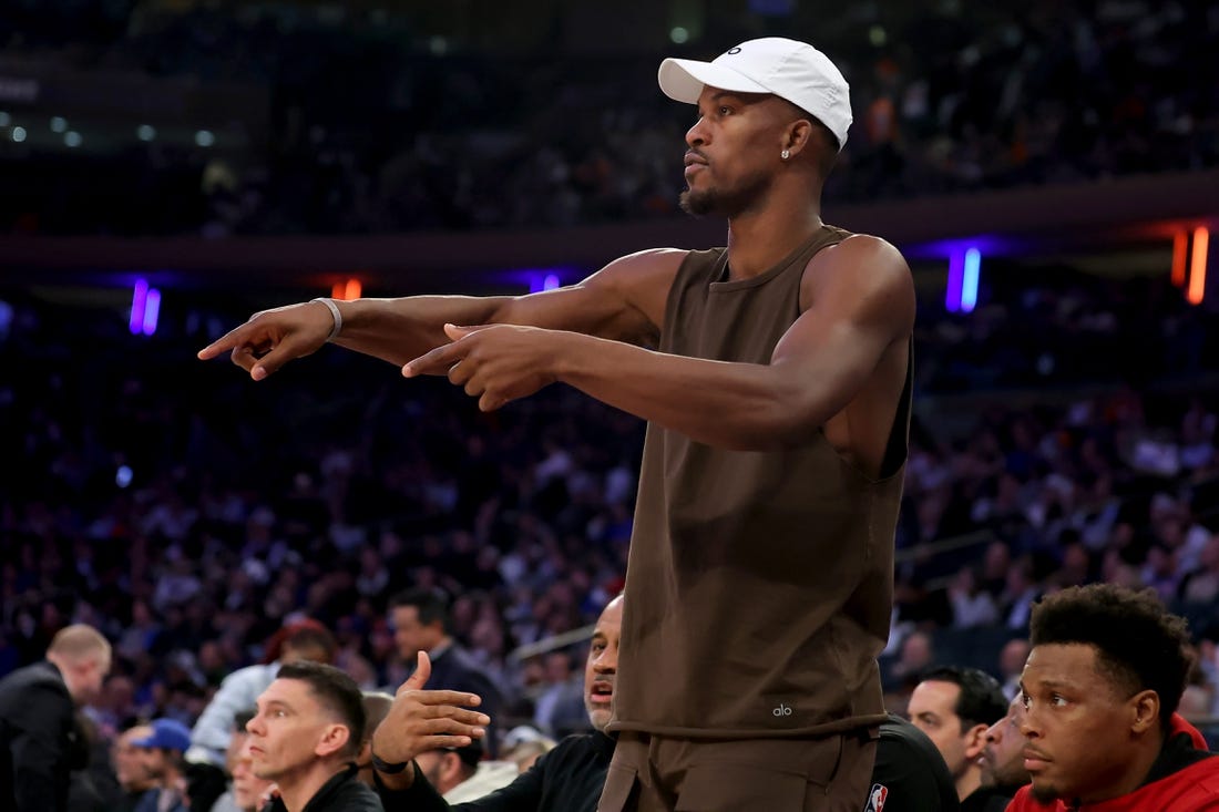 May 2, 2023; New York, New York, USA; Miami Heat injured forward Jimmy Butler (22) talks to his teammates from the bench during the third quarter of game two of the 2023 NBA Eastern Conference semifinal playoffs against the New York Knicks at Madison Square Garden. Mandatory Credit: Brad Penner-USA TODAY Sports