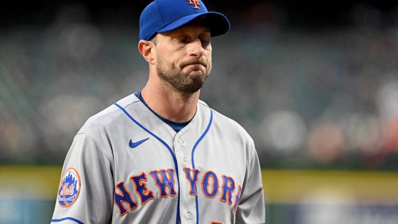 May 3, 2023; Detroit, Michigan, USA; New York Mets starting pitcher Max Scherzer (21) walks off the field after giving up six runs in 3 1/3 innings against the Detroit Tigers  at Comerica Park. It was Scherzer's first game back after serving a ten game suspension. Credit: Lon Horwedel-USA TODAY Sports