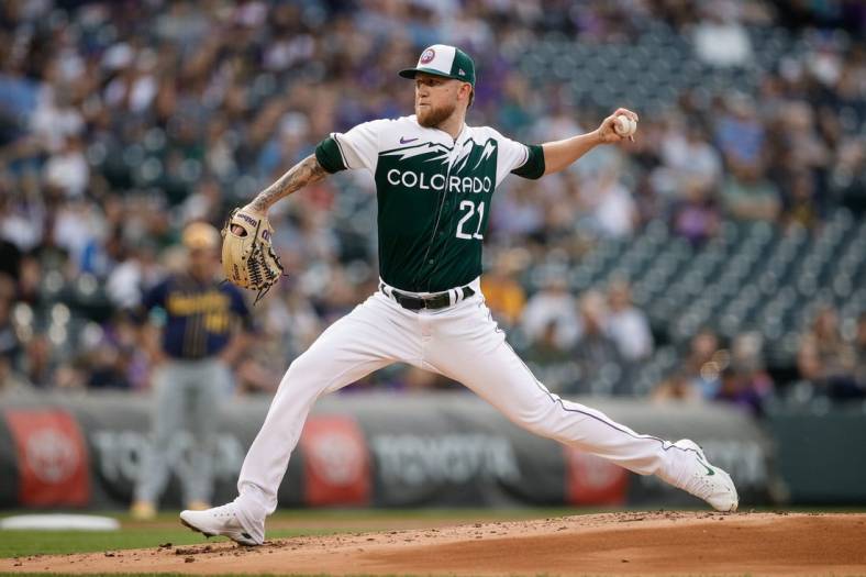 May 3, 2023; Denver, Colorado, USA; Colorado Rockies starting pitcher Kyle Freeland (21) pitches in the second inning against the Milwaukee Brewers at Coors Field. Mandatory Credit: Isaiah J. Downing-USA TODAY Sports