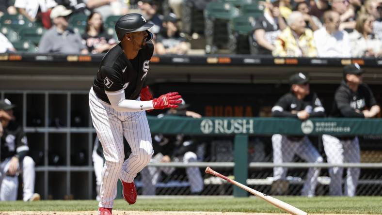 May 4, 2023; Chicago, Illinois, USA; Chicago White Sox designated hitter Eloy Jimenez (74) watches his two-run home run against the Minnesota Twins during the third inning at Guaranteed Rate Field. Mandatory Credit: Kamil Krzaczynski-USA TODAY Sports