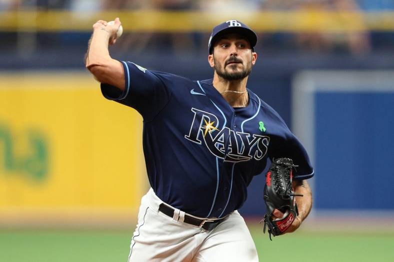 May 4, 2023; St. Petersburg, Florida, USA;  Tampa Bay Rays starting pitcher Zach Eflin (24) throws a pitch  against the Pittsburgh Pirates in the second inning at Tropicana Field. Mandatory Credit: Nathan Ray Seebeck-USA TODAY Sports
