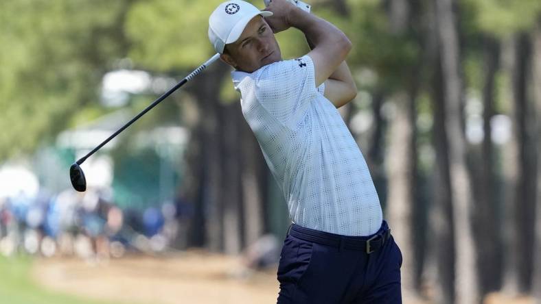 May 4, 2023; Charlotte, North Carolina, USA; Jordan Spieth hits his second shot on ten during the first round of the Wells Fargo Championship golf tournament. Mandatory Credit: Jim Dedmon-USA TODAY Sports